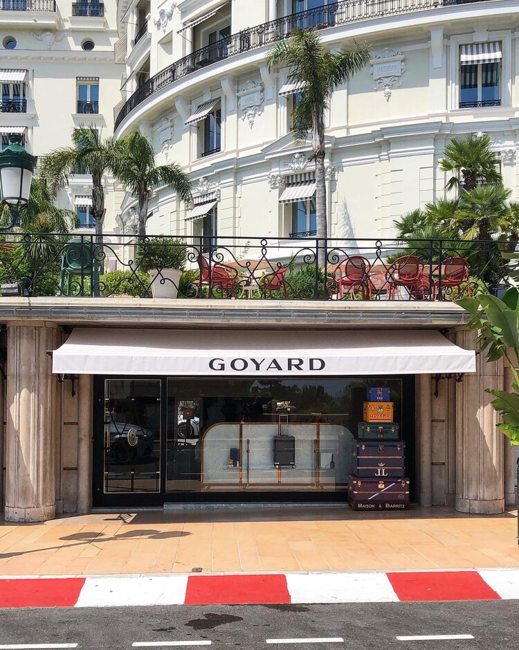 The facade of Goyard’s Monte-Carlo flagship, fronted immediately by the Monaco Grand Prix circuit. Image  Via